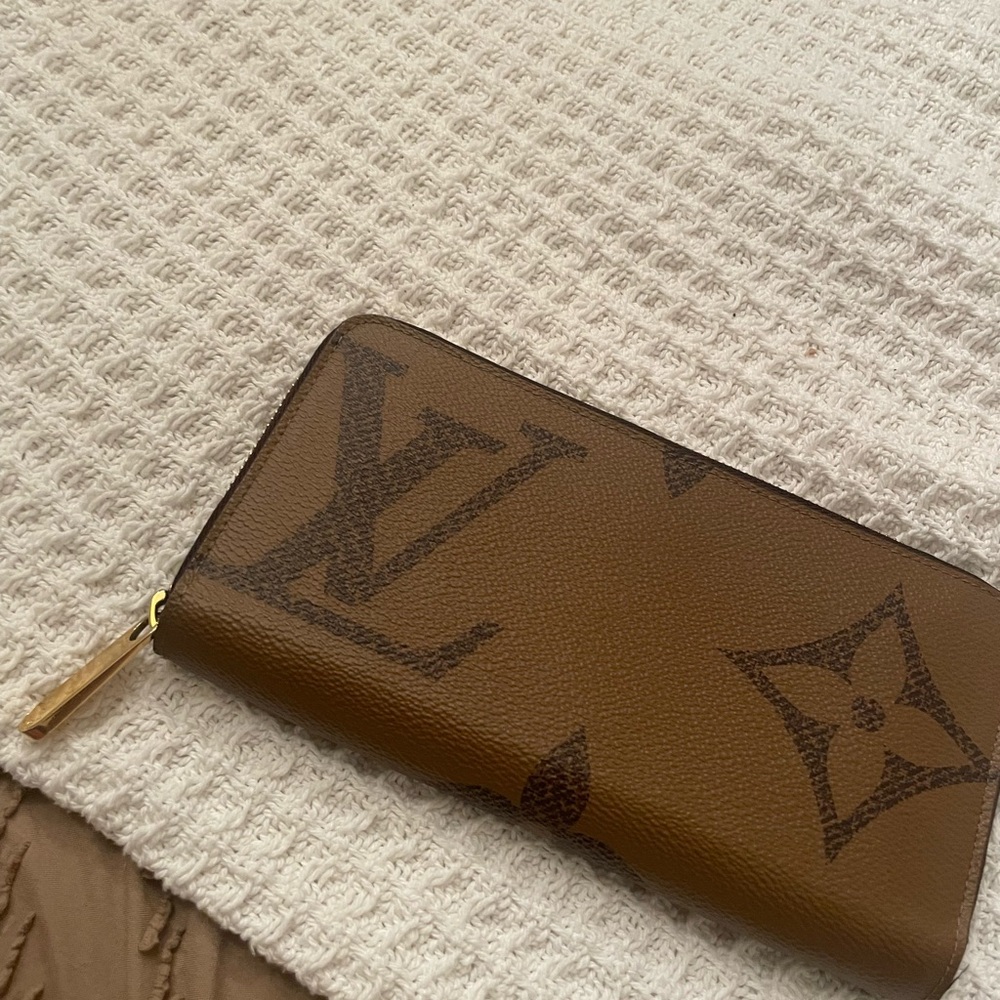 Louis Vuitton Black Leather Zip-Around Wallet with Gold Hardware